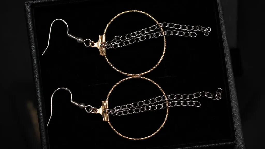 boucle d'oreille 18k et chaine inox argenté