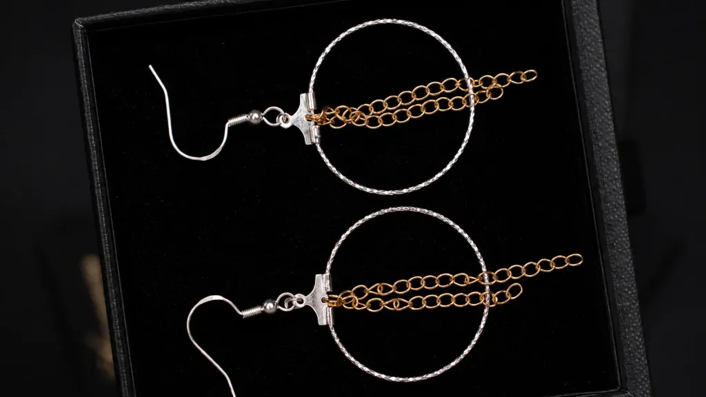 boucle d'oreille 925 et chaine inox dorée